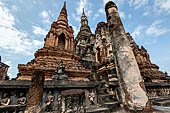 Thailand, Old Sukhothai - Wat Mahathat, the main chedi is composed by a platform with a chedi in the centre, with the characteristic shape of a lotus bud, surrounded by eight smaller chedi at the cardinal points.  